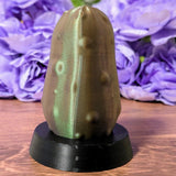 Back view of Emotional Support Pickle showing curved shape and subtle detailing.