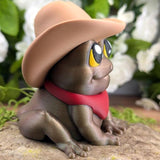 Right side angle of Cowboy Frog with a clear view of its eye, hat brim, and the shimmer in the green body.