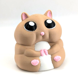 A very fat hamster with large eyes sits on a white background.