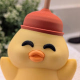 Close-up front view of smiling plunger duck with eyes shut in joy and orange beak mid-quack.