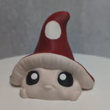Video preview of a mushroom creature with a large red cap with white spots.