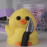 A video showing all angles of a stabby duck, a yellow duck holding a knife.