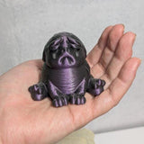 Plum Despair Purple Squonk held gently in a hand, dramatically dripping with despair and possibly My Chemical Romance lyrics.