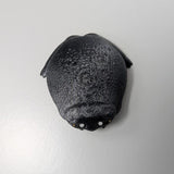 Top-down view of the Depressed Dumpling™ frog figurine, showing its slouched posture and rounded back.