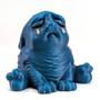 A crying blue Squonk sits on a white background. He is shiny and sparkling, and full of despair.