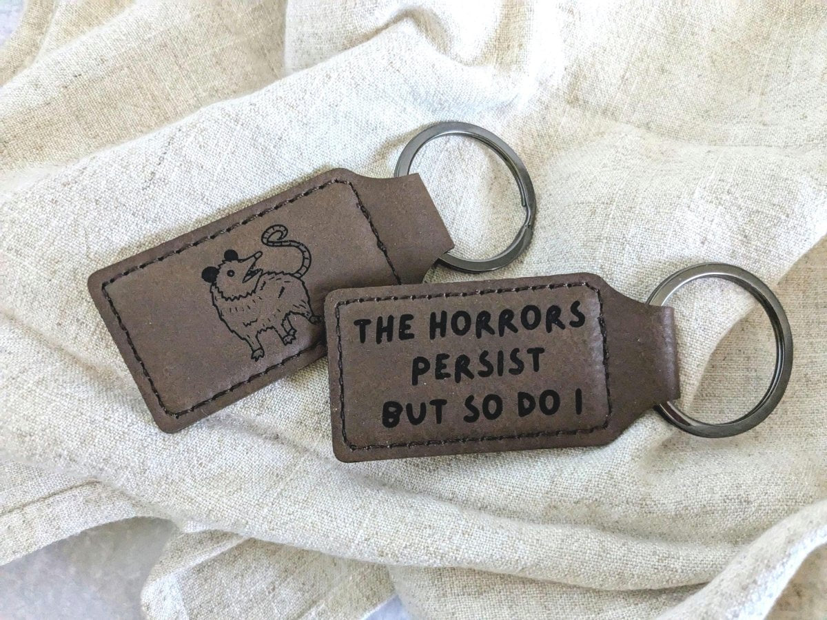 "The Horrors Persist But So Do I" Keychain - The Adorable Alchemist